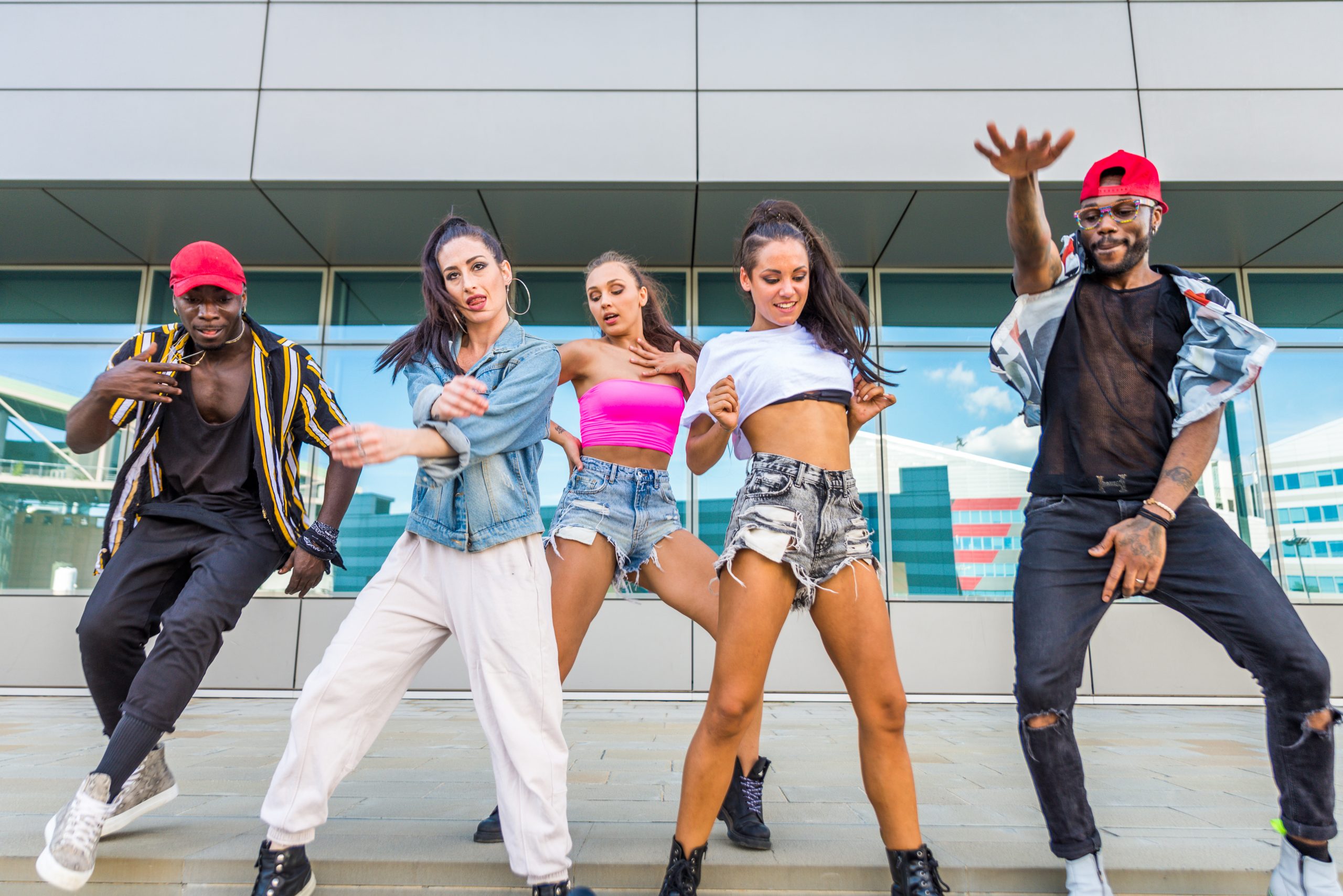 Hip hop crew dancing outdoors